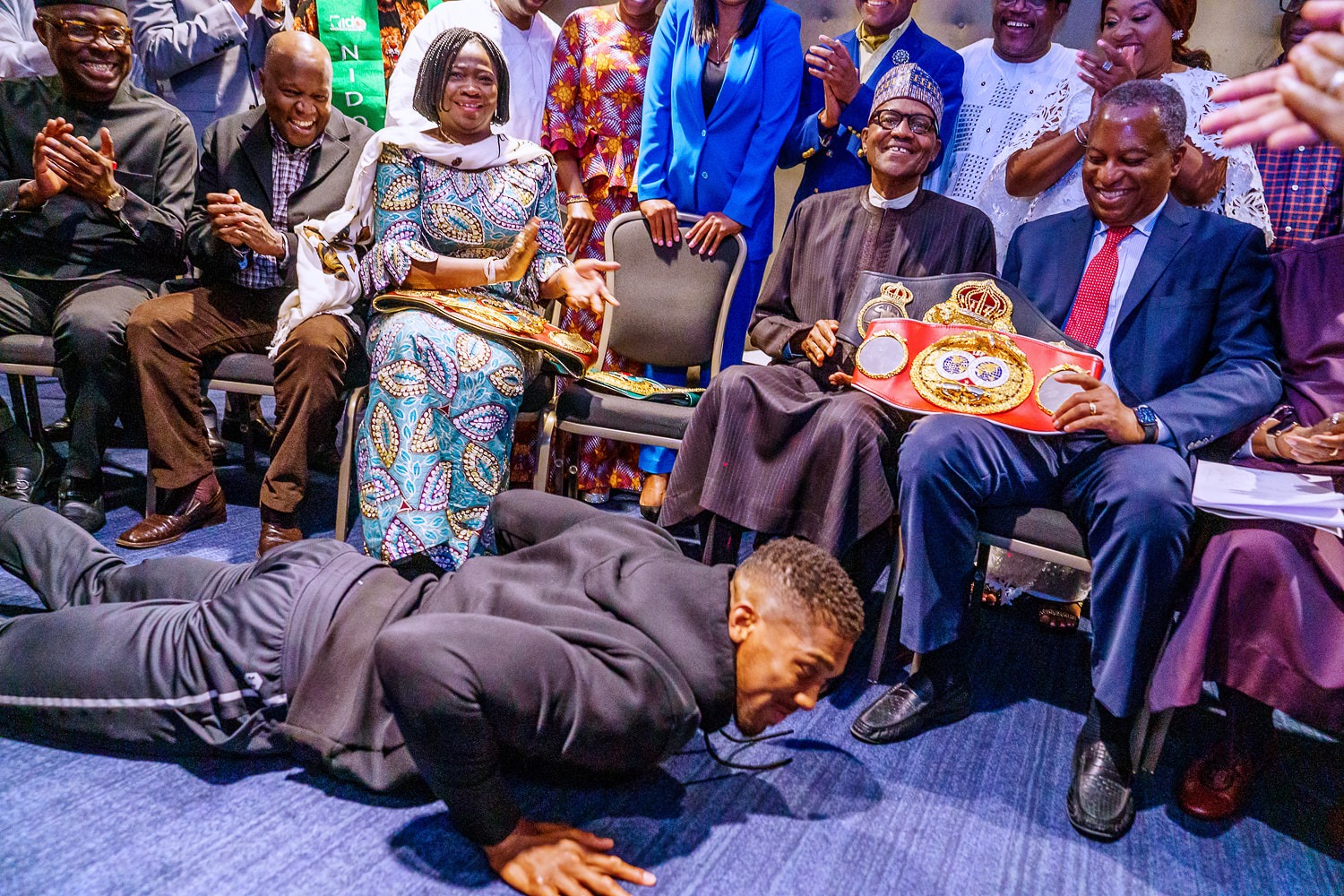 anthony joshua presents belts to Buhari 2