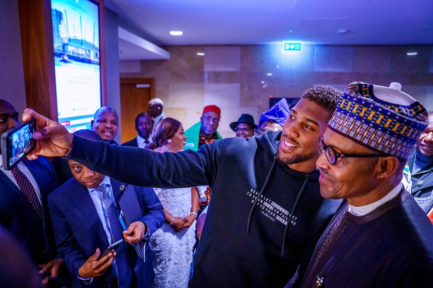 anthony joshua presents belts to Buhari 4