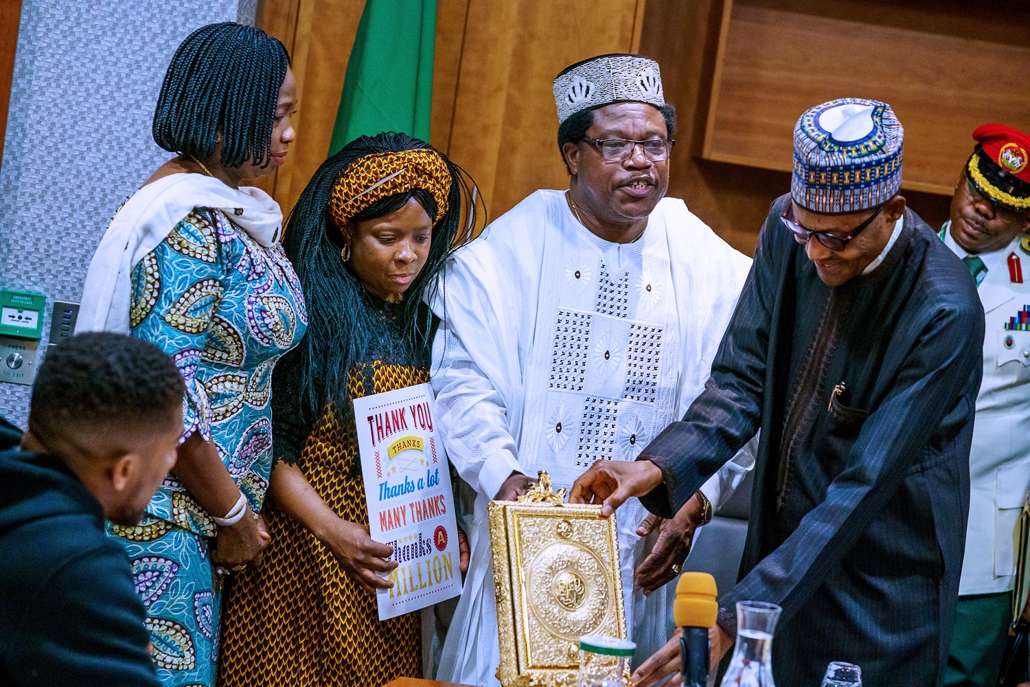 anthony joshua presents belts to Buhari 5