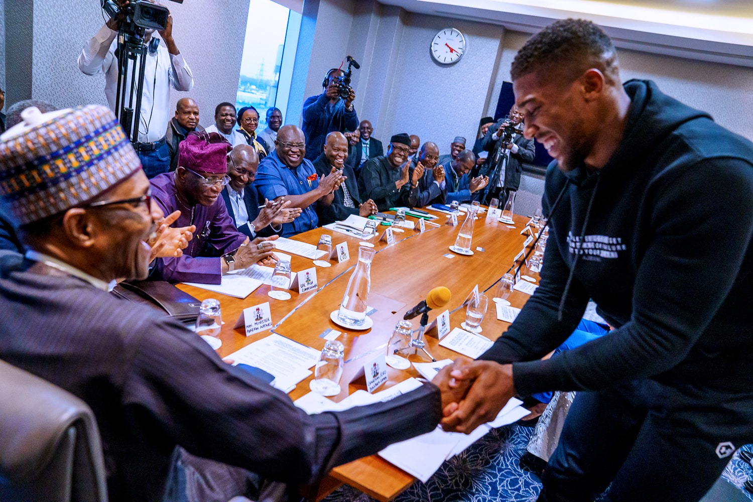 anthony joshua presents belts to Buhari 6