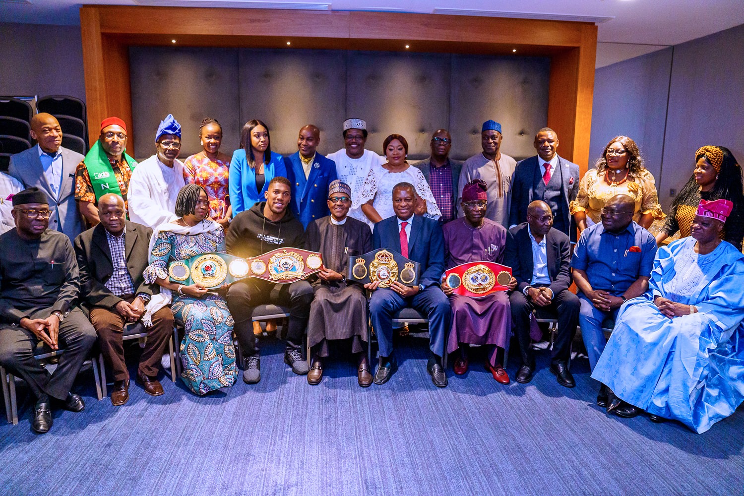 anthony joshua presents belts to Buhari 7