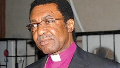 COVID-19 Lockdown: Popular Enugu Bishop Dares Buhari, Holds Service