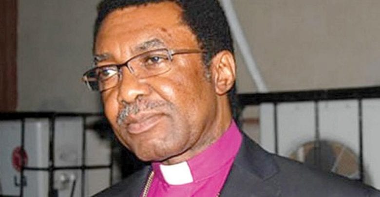 COVID-19 Lockdown: Popular Enugu Bishop Dares Buhari, Holds Service