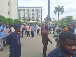 BREAKING: Tension as workers lock Tinubu’s minister in his office [PHOTOS] - Photo/Image