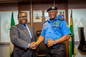 INEC Chairman, Amupitan and IGP Tunji Disu 