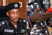 FCT Commissioner of Police Ahmed Sanusi, Police Officer Checking Phone