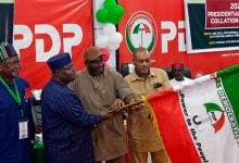 Senator Sandy Onor receives the PDP flag after emerging as the party's 2027 presidential candidate