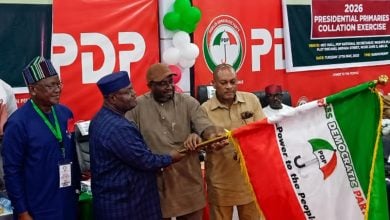 Senator Sandy Onor receives the PDP flag after emerging as the party's 2027 presidential candidate