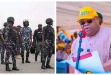 Police officers and Governor Ademola Adeleke
