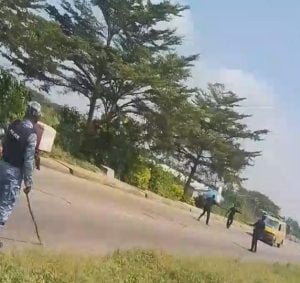 Police officers at one of the checkpoints before Obadore bridge.