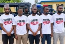 Five Nigerians who were detained in Maiduguri for wearing T-shirts bearing the inscription, “Tinubu Must Go.”