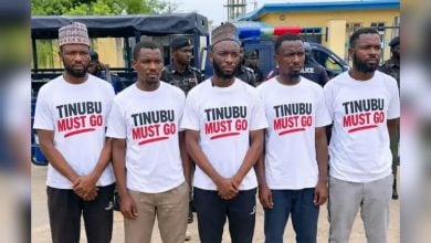Five Nigerians who were detained in Maiduguri for wearing T-shirts bearing the inscription, “Tinubu Must Go.”